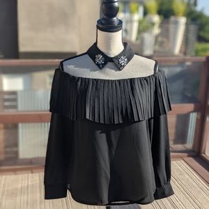 Black evening shirt with dramatic accents
